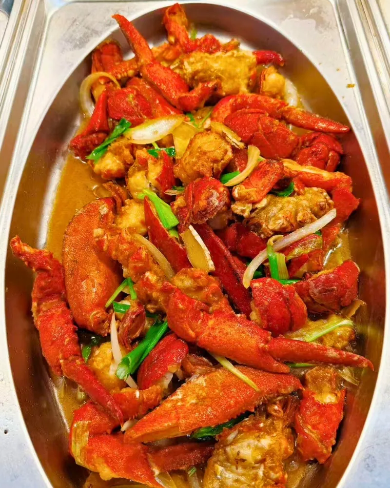 Stir-fried crab legs with garlic and green onion at Ichiraku Seafood Buffet & Grill, a Asian Restaurant in North Providence