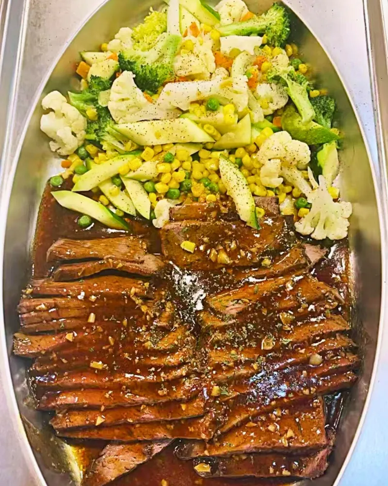 Savory sliced beef with fresh mixed veggies at Ichiraku Seafood Buffet & Grill, a Asian Restaurant in North Providence
