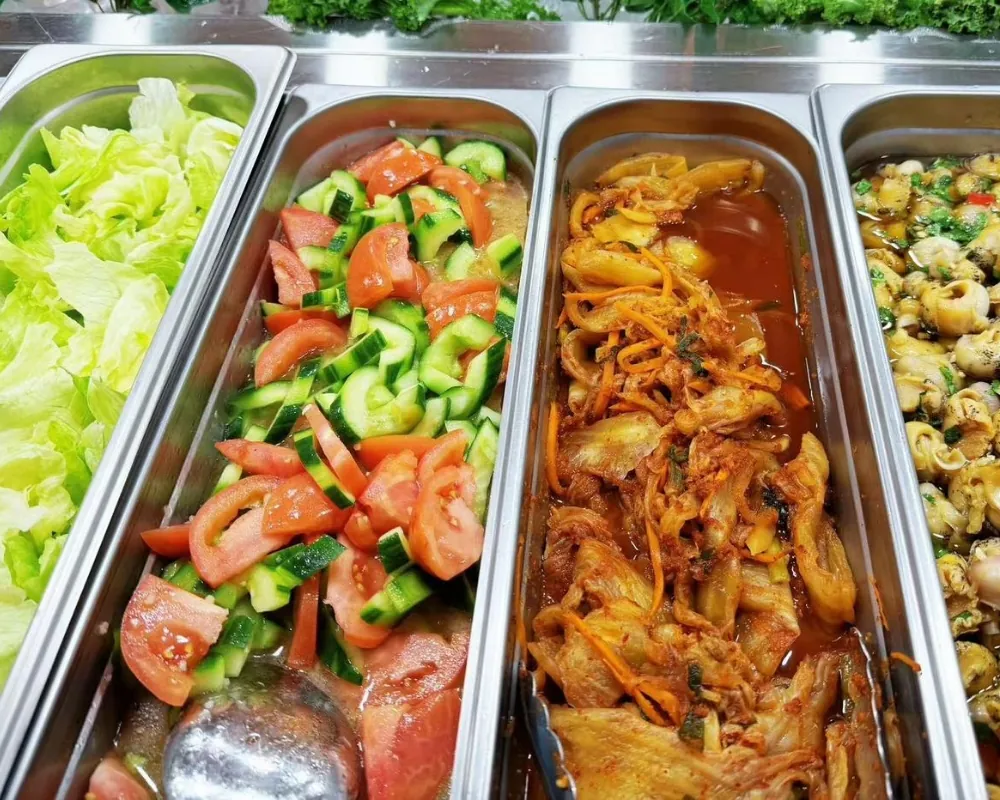 Fresh salad mix and spicy kimchi at Ichiraku Seafood Buffet & Grill, a Asian Restaurant in North Providence