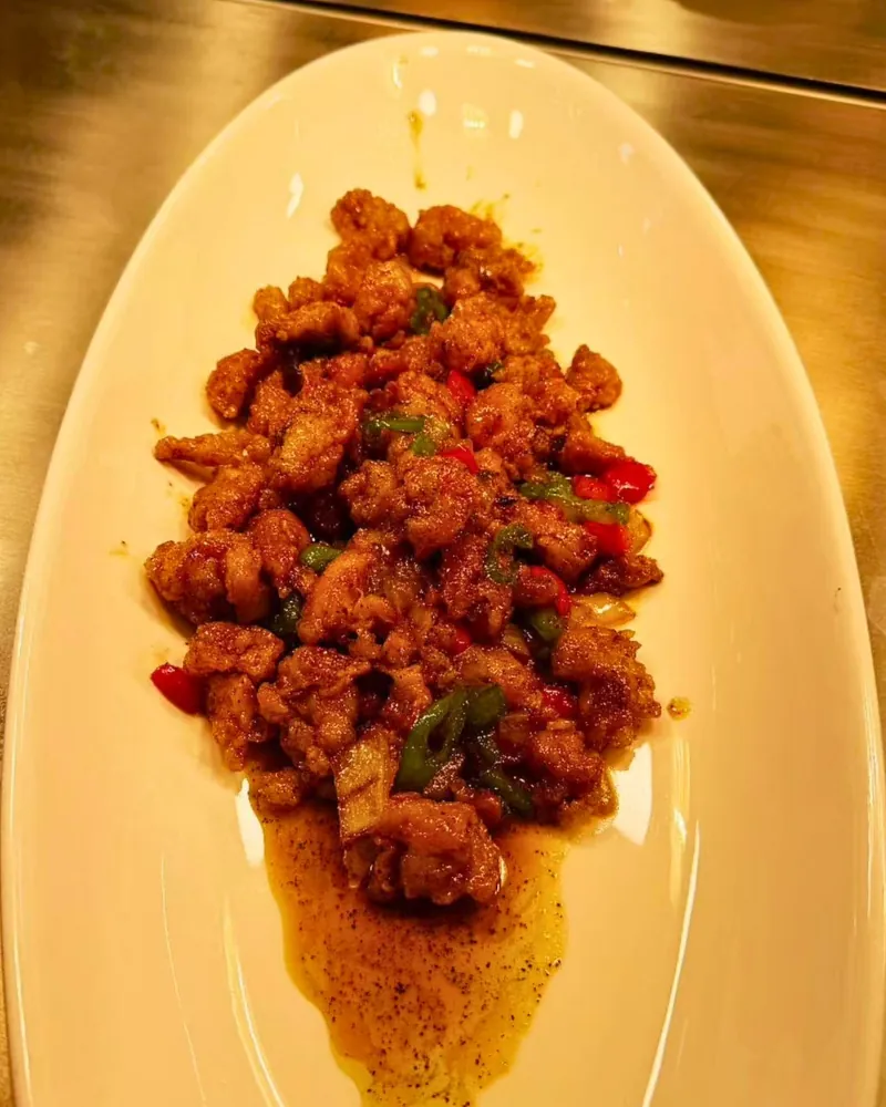 Crispy pork cubes stir-fried in spicy Sichuan sauce at Ichiraku Seafood Buffet & Grill, a Asian Restaurant in North Providence